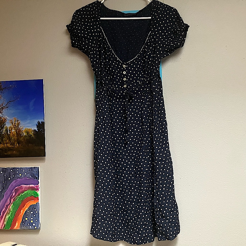 Brandy Melville, size small (fits XS and M), navy blue with polka dot flowers.